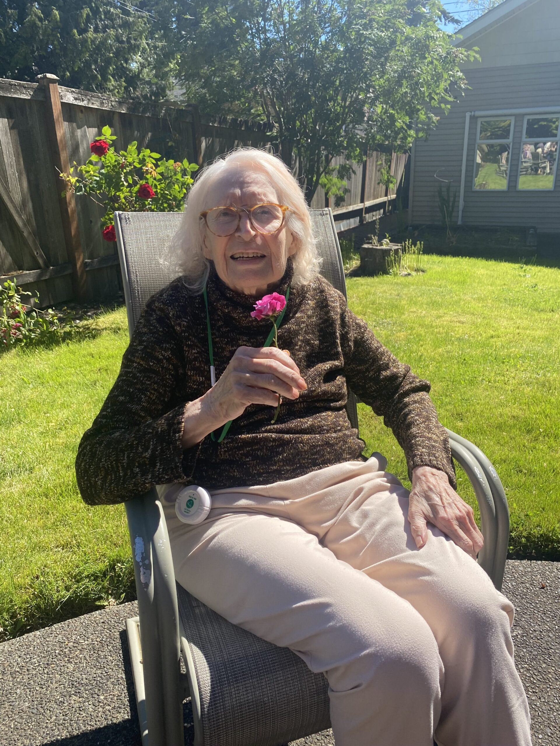 Longhouse resident enjoying the sunshine outdoors