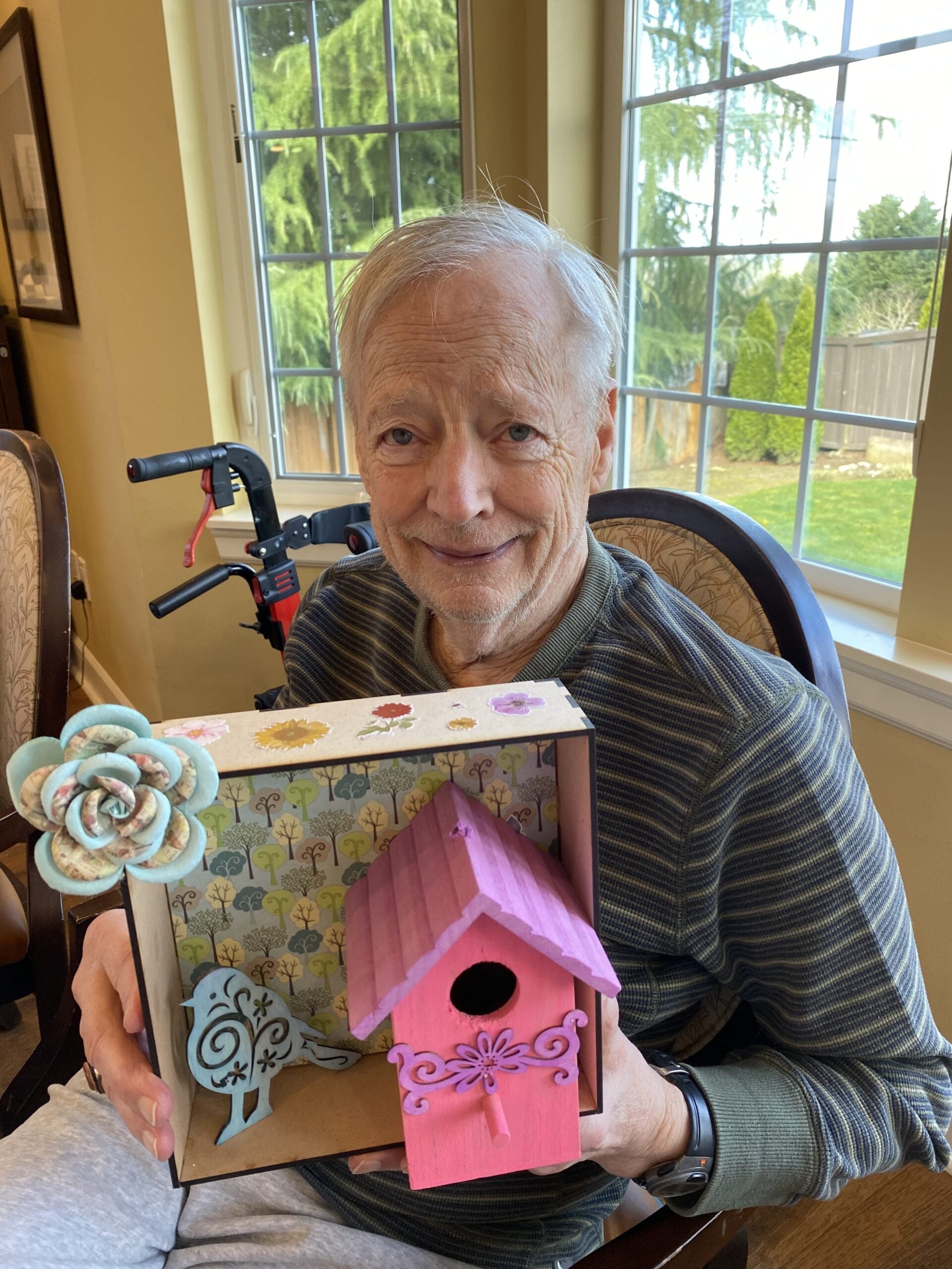 Longhouse resident enjoying a craft activity